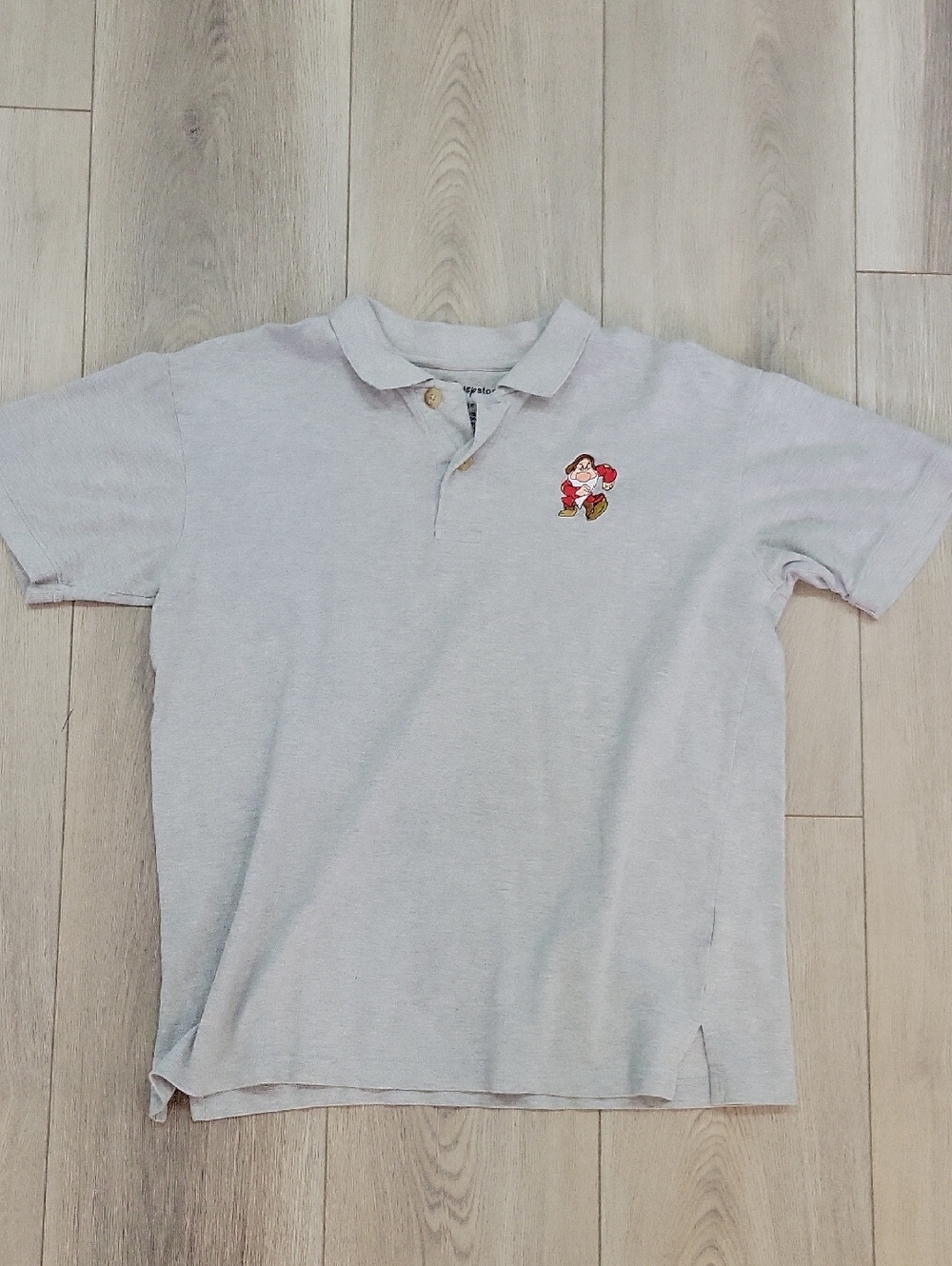 Light Gray Polo Shirt with Embroidered Grumpy Cartoon Patch